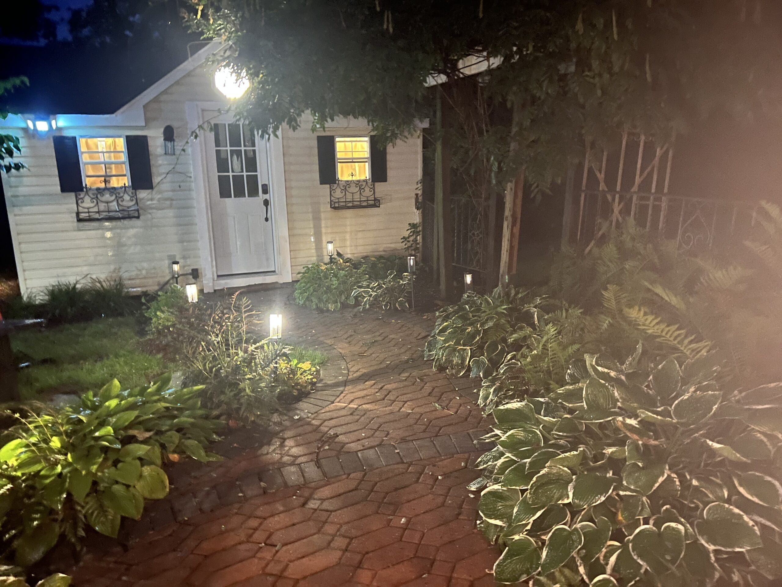 Bedroom at night outside airbnb indoor pool