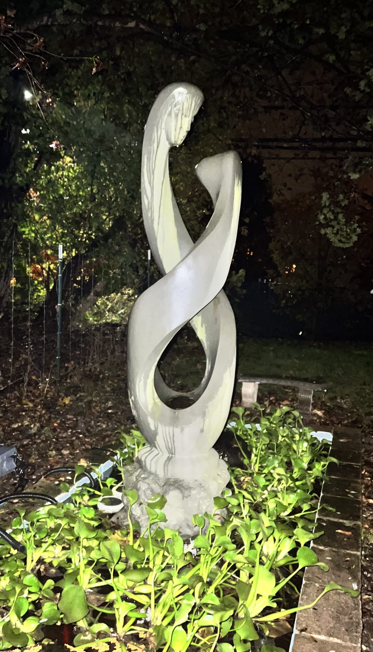 Granite Sculpture of Mother Looking at Daughter